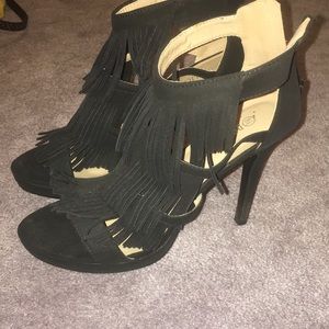 Super cute black ankle zip up heels w fray on them